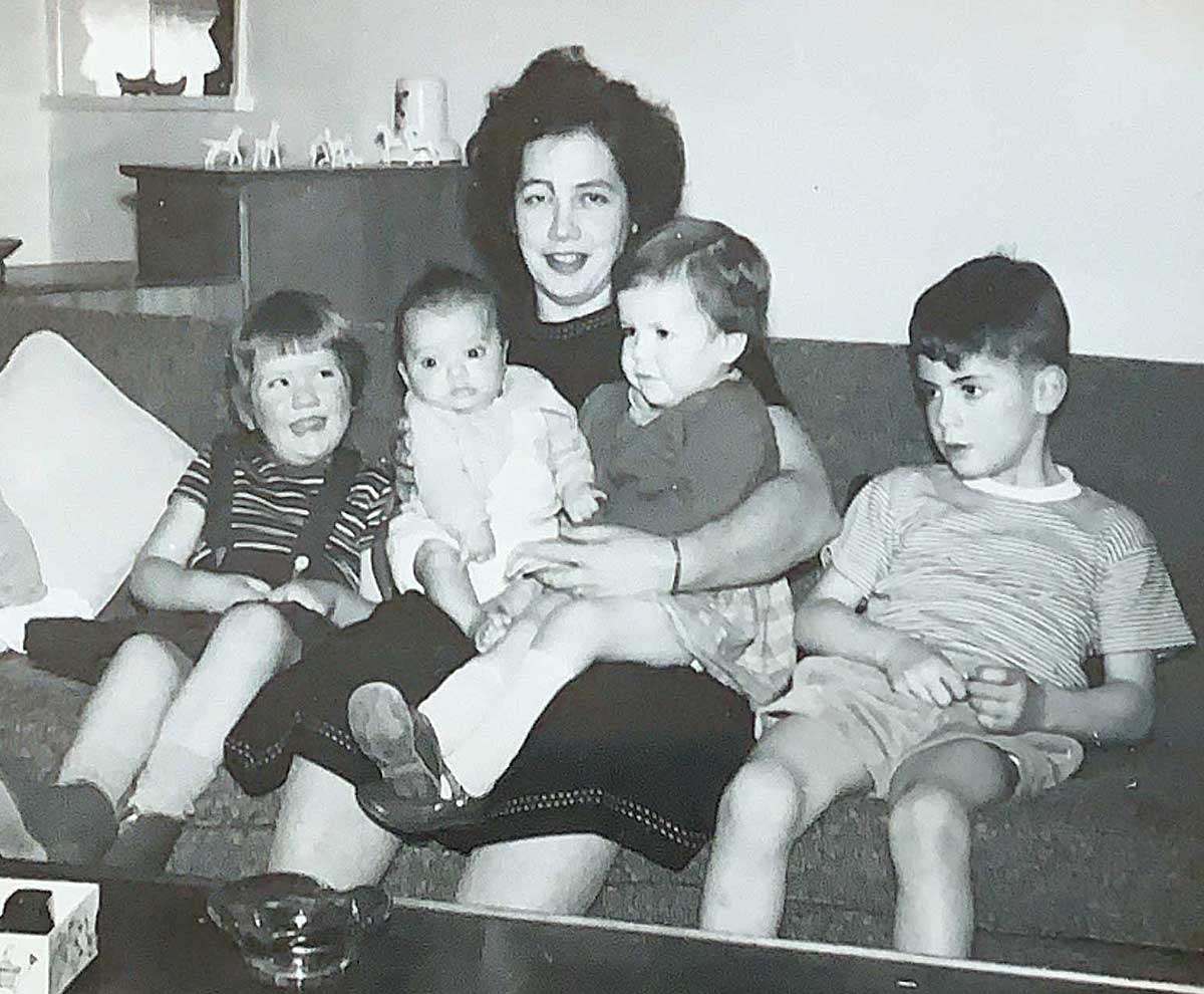 Dr. Stuart (far right) with his mother and siblings