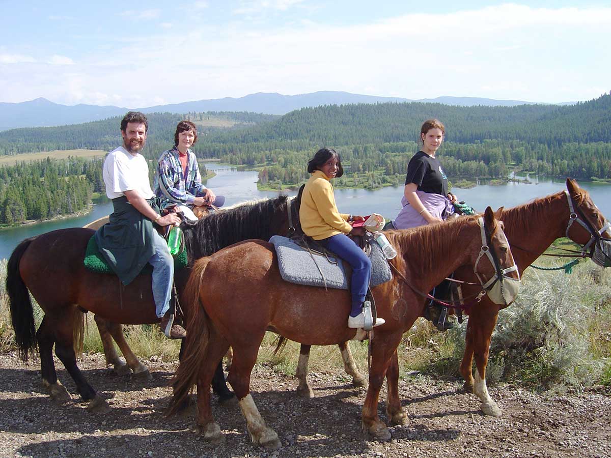 Riding in Wyoming National Park with his family
