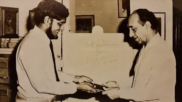 1983, Age 37. Autographed photo with Sri Lanka President Jayewardene