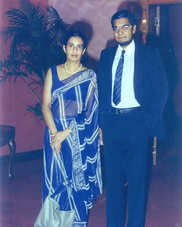 1986, age 41. with wife